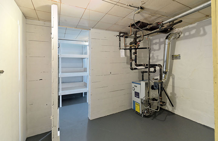 023-Furnace Room With Storage Spaces On Both Sides
