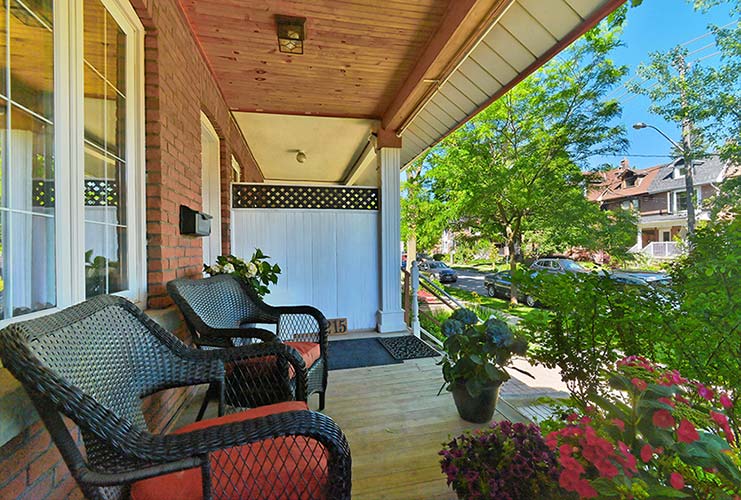 003-Beautiful Mix of Real Wood and Brick Front Porch
