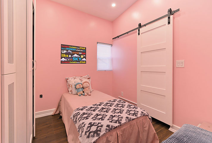 044-Bedroom 1 With Sliding Barn Door to Ensuite