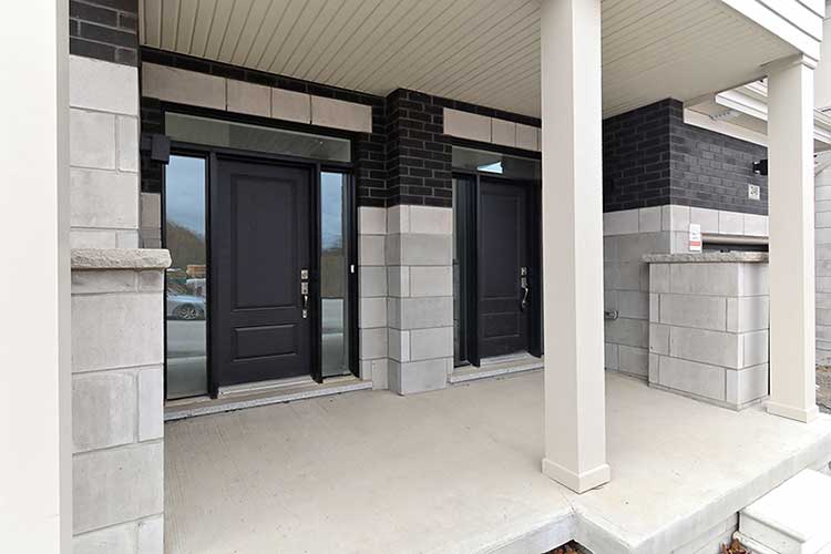 007-Large Concrete and Stone Covered Front Porch